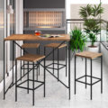 High industrial style bar stools and counter height table. Made of MDP Wood and black steel legs in a balcony