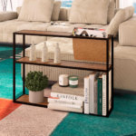 Industrial style end table with 2 shelves and 1 magazine rack. Made of wood and black steel frame